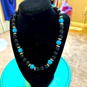 18” very nice blue and black bead necklace. Casual or formal wear